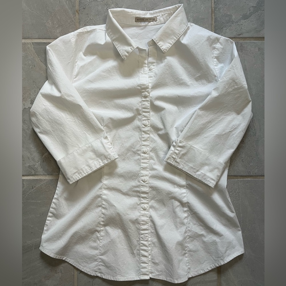 White collared button down dress shirt in a size large.